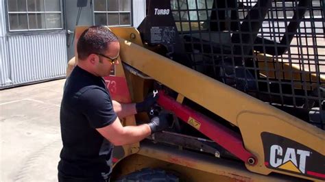 manually raise a skid steer arms|cat skid steer loader lift arms.